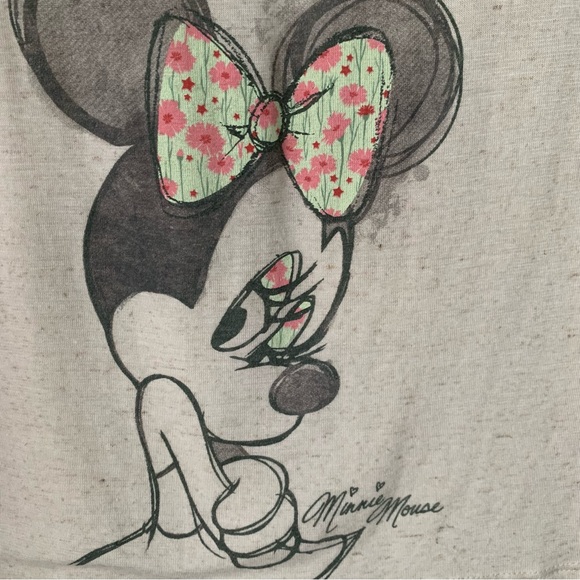 Disney Boutique Tops - Disney Boutique Minnie Mouse Cream Tee with a Row of of Floral Bows down back